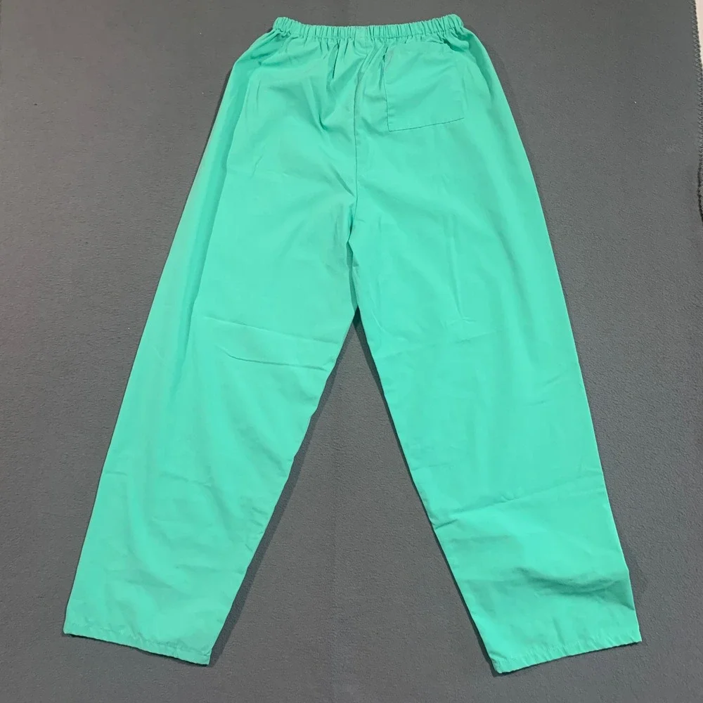 Spirit Halloween Dentist Scrubs Costume Set Mint Green Tooth Applique Size S/M - Picture 15 of 15